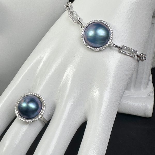 Thalassa Nereids III – Blue maple ring with zircon accents